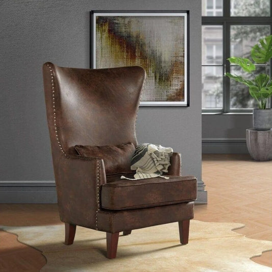 Harrison Wide Wingback Chair with Studded Trim and Decorative Pillow